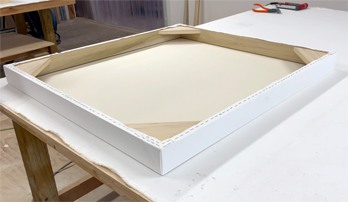 Large canvas panels are custom cut, mounted rigidly for stability, primed, and delivered tension-free but ready for framing. Panels ship flat in crates for corner security and surface protection. Studio convenience with gallery-scale usability.