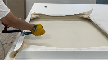 A stretched canvas hanger arrives pre-installed with wire or hardware so your custom canvas is ready to hang out of the crate. Each canvas is built tensioned, primed, and framed to spec. Save time and energy—just unpack and hang.