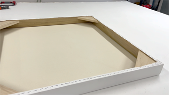 Our stretched canvas magazine issue spotlights custom canvas builds for cover-worthy art—ready to highlight your work. Each canvas is primed, tensioned, framed, and packed inside a wood crate. Showcase-quality presentation for featured artists.