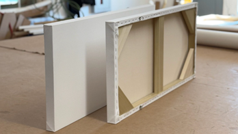 New Zealand artists receive custom-size stretched canvases built locally with heavy stretcher frames and professional priming. Each canvas ships tight and secure in a reusable wood crate. Gallery-quality delivery right to your access.